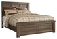 Juararo King Panel Bed with Mirrored Dresser, Chest and 2 Nightstands